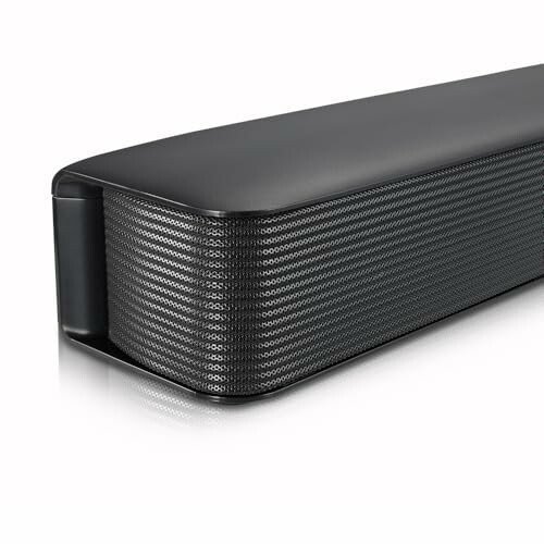 Close-up view of a black soundbar speaker.
