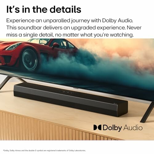 Soundbar with Dolby Audio and sports car on TV screen.