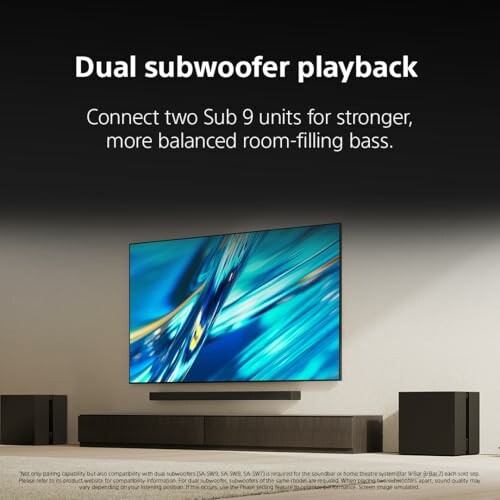 TV setup with dual subwoofers for enhanced bass.