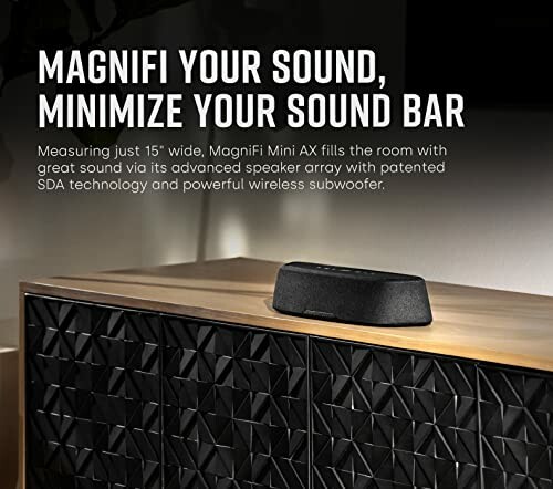 Polk Audio MagniFi Mini AX soundbar on a cabinet.