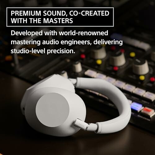 High-quality headphones on a sound mixing console.