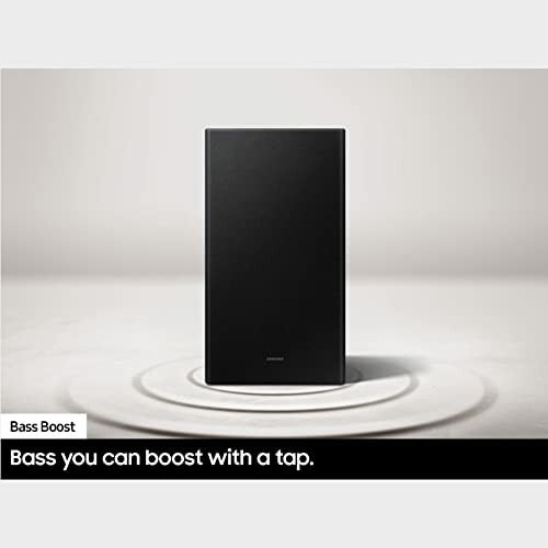 Black speaker with bass boost feature on a white background.