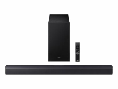 Black soundbar with subwoofer and remote control.