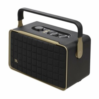 Vintage-style portable speaker with handle and control knobs.