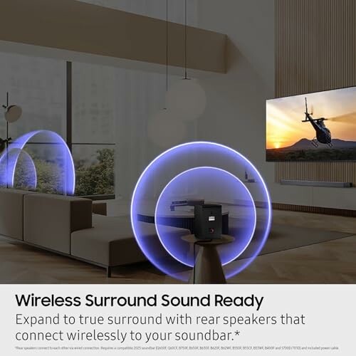 Room setup with wireless surround sound speakers and TV.