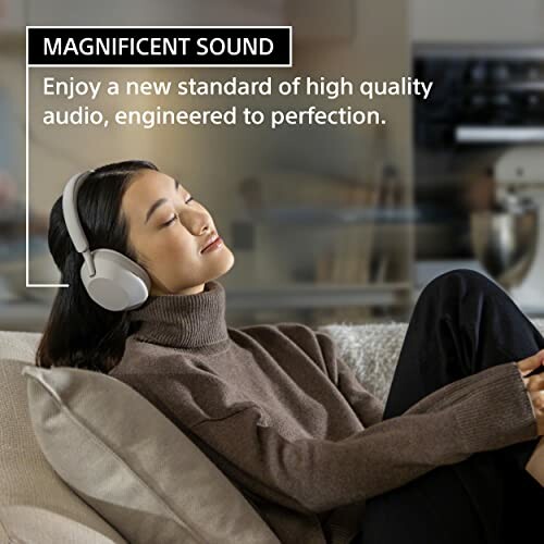 Woman relaxing with headphones, enjoying high-quality audio.